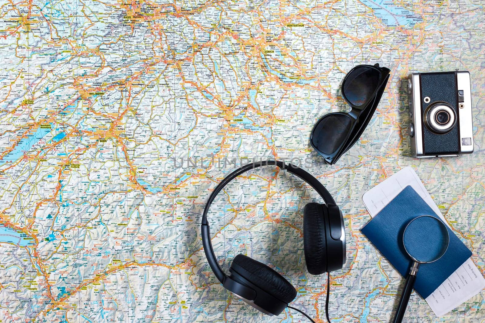 Travel plan, trip vacation accessories for trip, tourism mockup - Outfit of traveler on map background. Flat lay and copyspace. Still life