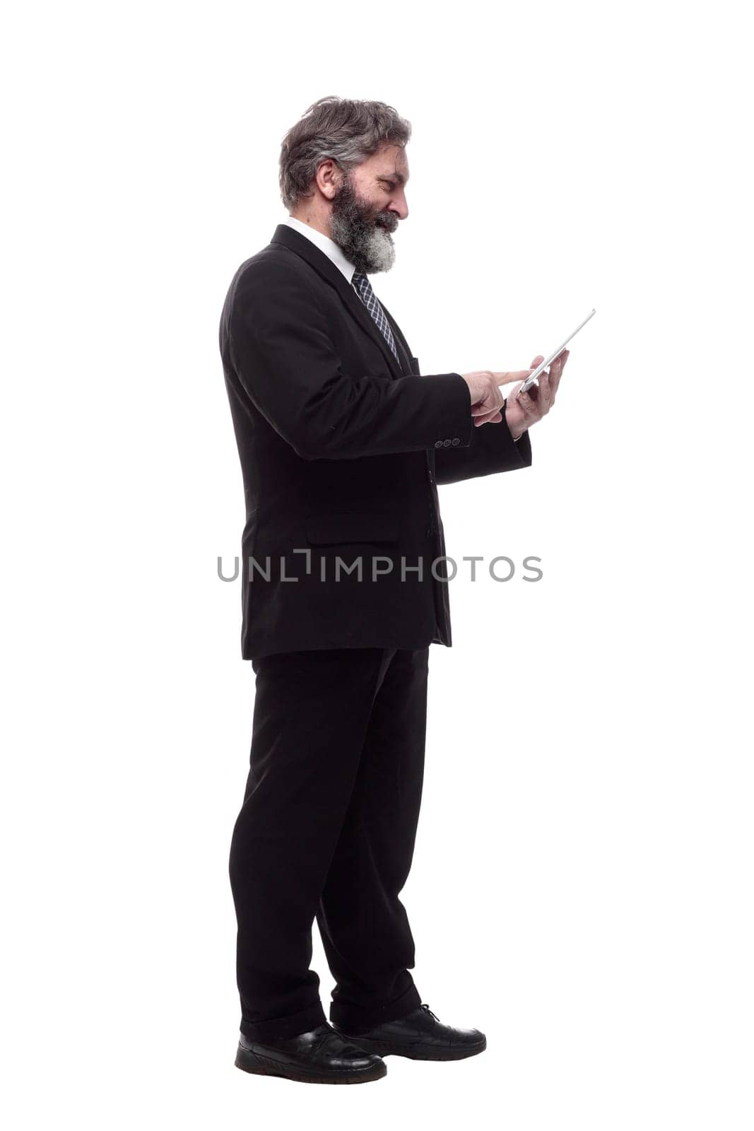side view. business man and using a digital tablet. isolated on a white
