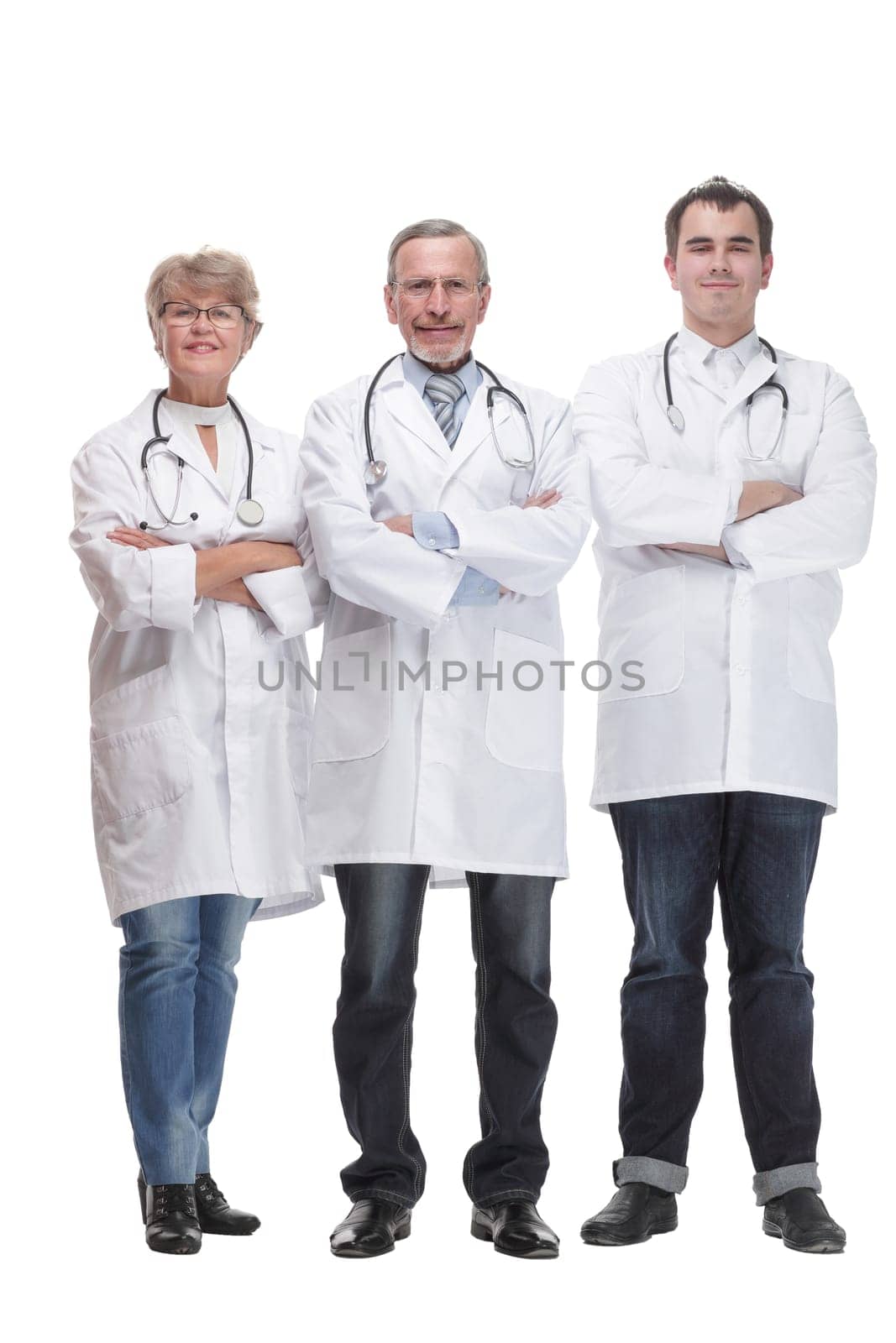 Portrait of group of smiling hospital colleagues standing together. Healthcare and medicine concept