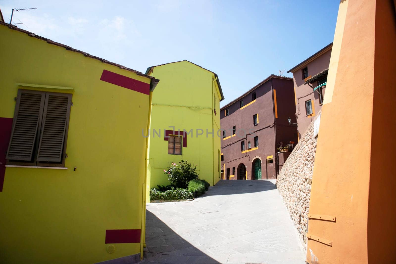 Photographic documentation of the colored houses in Ghizzano Pisa Italy 