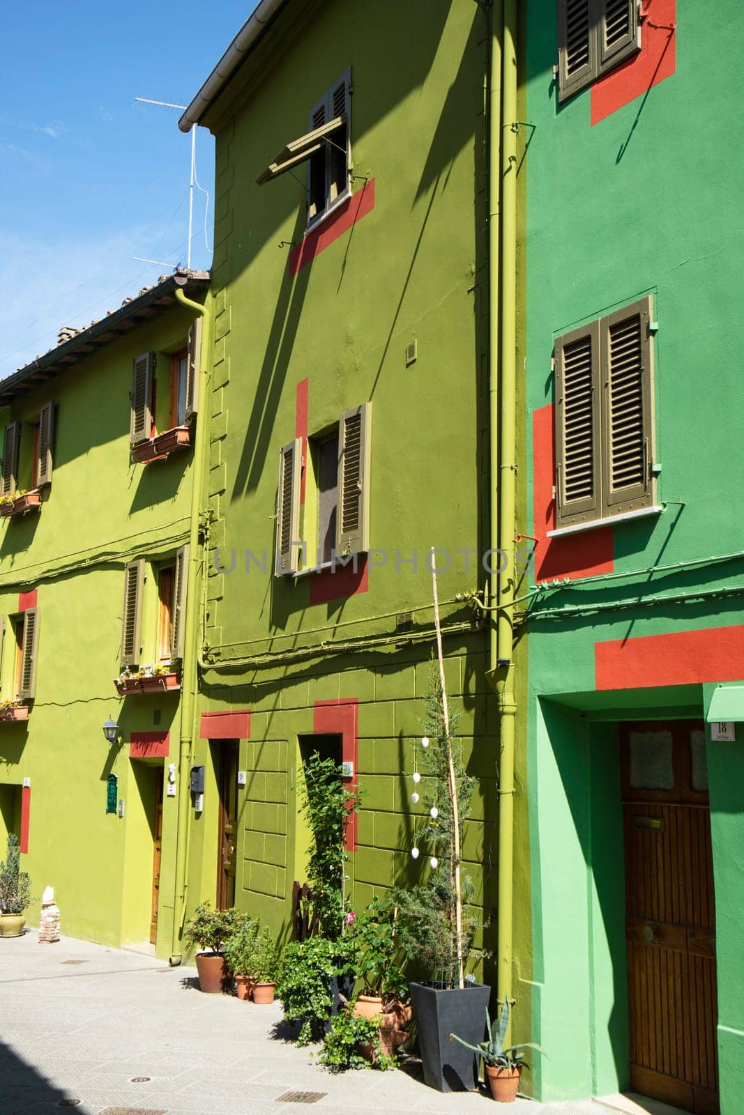 Photographic documentation of the colored houses in Ghizzano Pisa Italy 