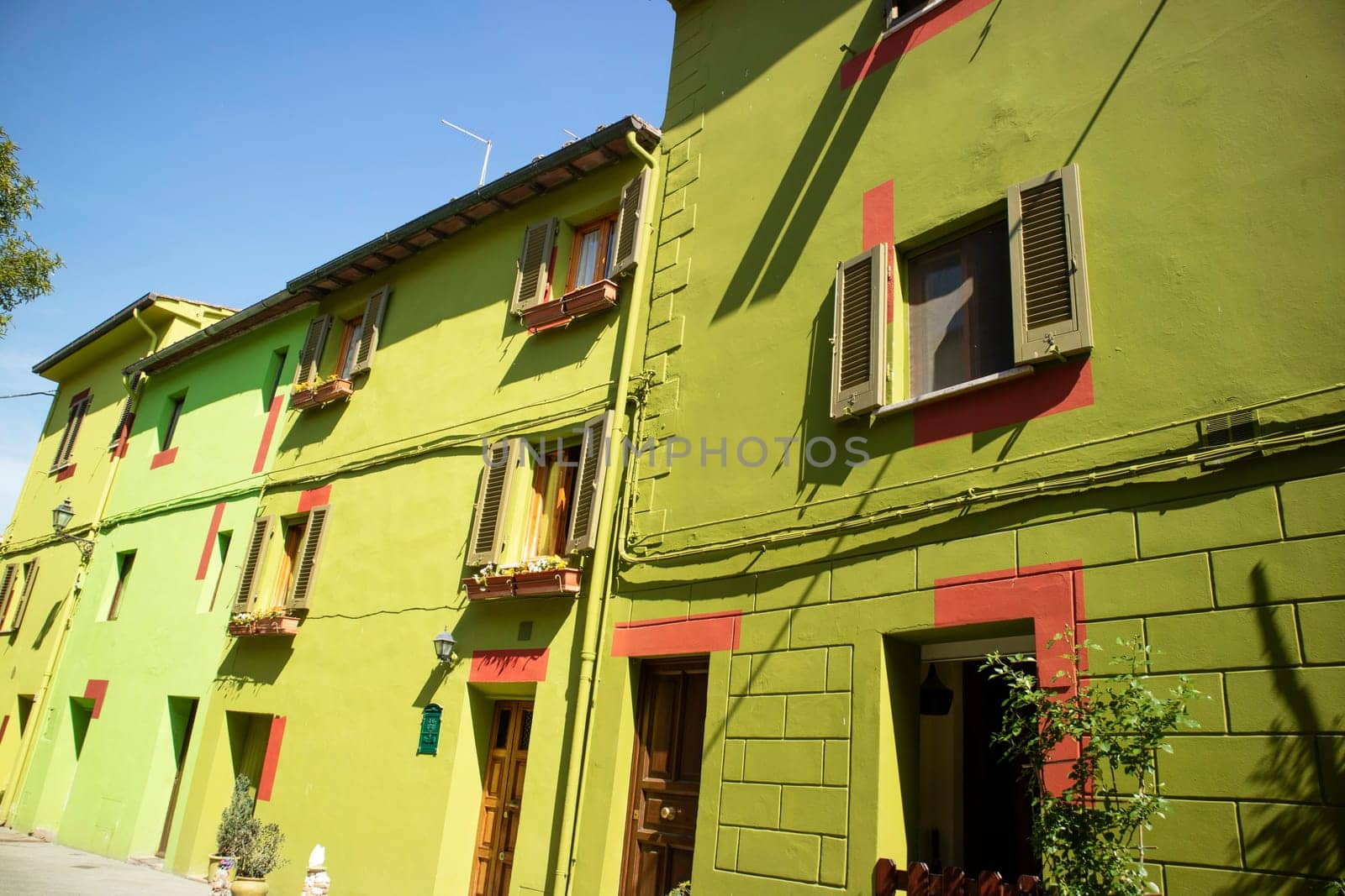 Photographic documentation of the colored houses in Ghizzano Pisa Italy 