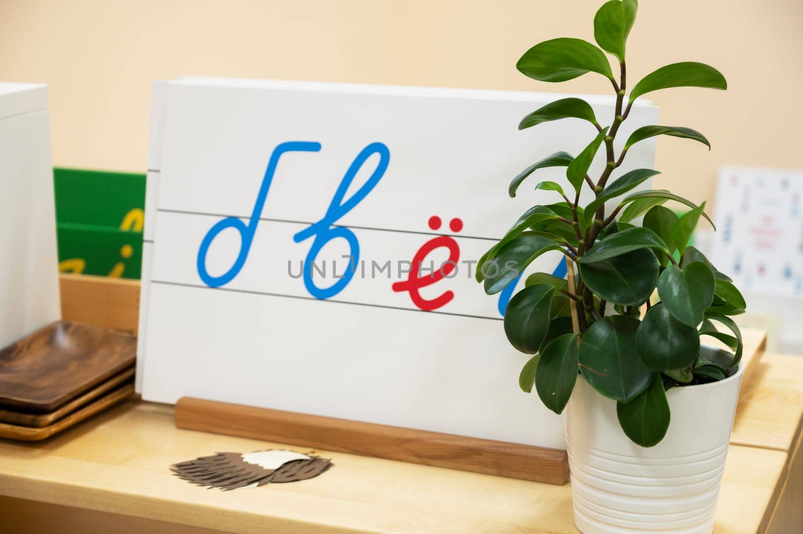 Classroom of Montessori kindergarten. The colorful Montessori material. Concept of children learning toy