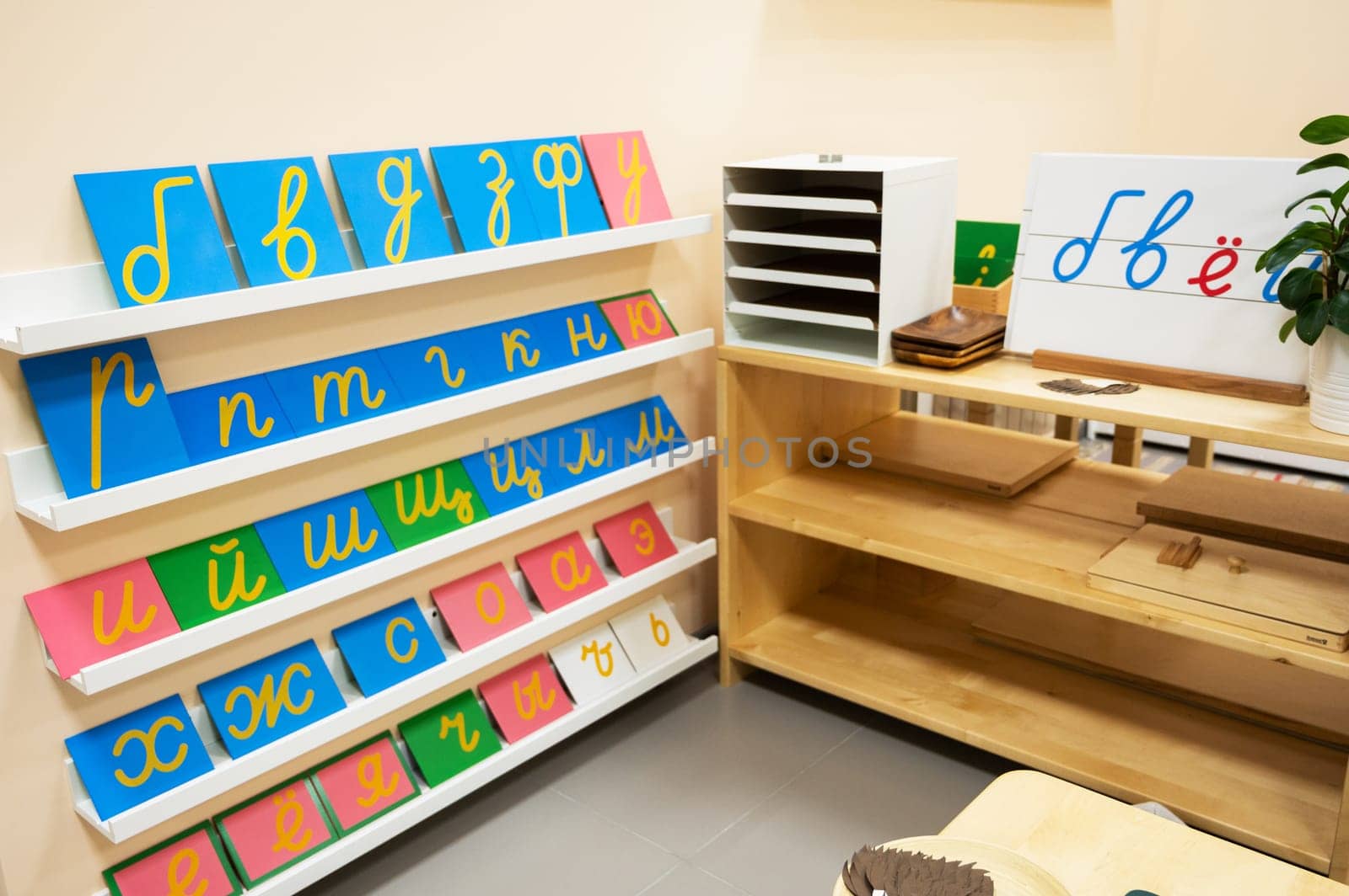 Classroom of Montessori kindergarten. The colorful Montessori material. Concept of children learning toy
