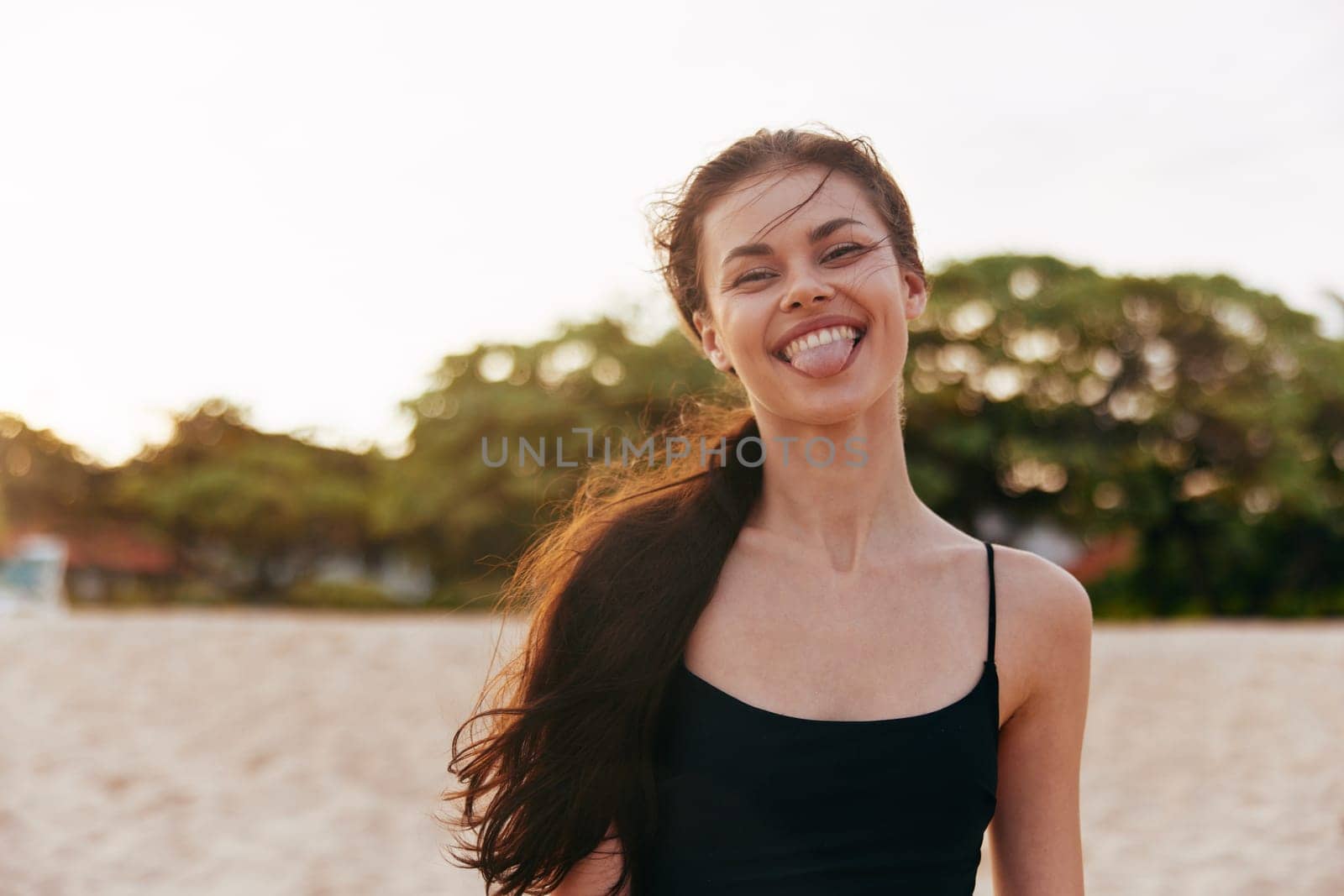 sunlight woman vacation sunset person ocean adult smile beach relax young leisure summer lifestyle sand sea coast tropical sky travel walking