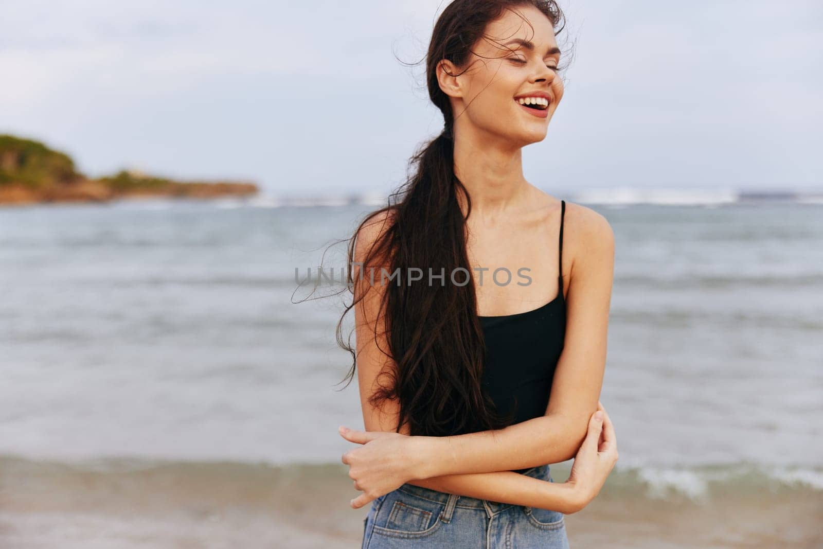 walking woman happiness coast summer running sunset lifestyle sand sea leisure beach vacation holiday sun dress young ocean sky smile happy