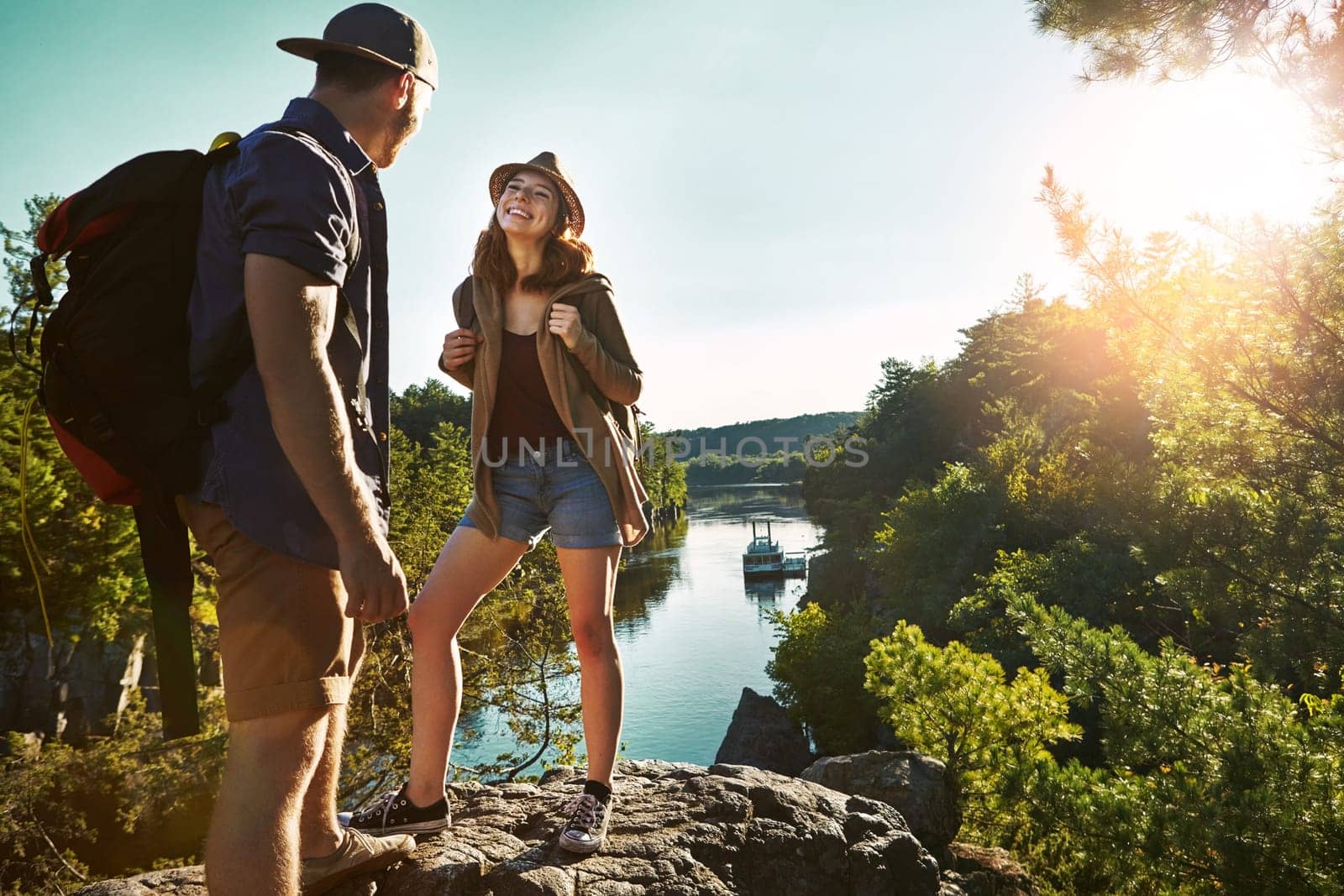 Find someone who wants to travel the world with you. a young couple out on an adventurous date in the mountains