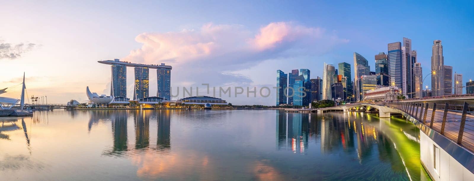 Downtown city skyline at the marina bay, cityscape of Singapore at sunrise