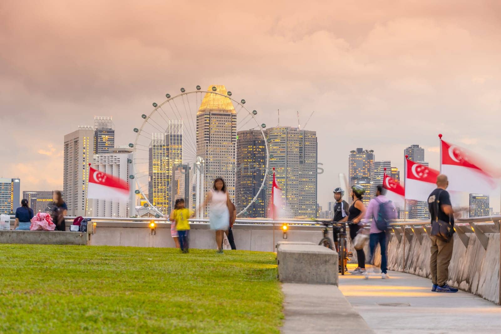 Downtown city skyline at the marina bay, cityscape of Singapore at sunset from Marina Barrage