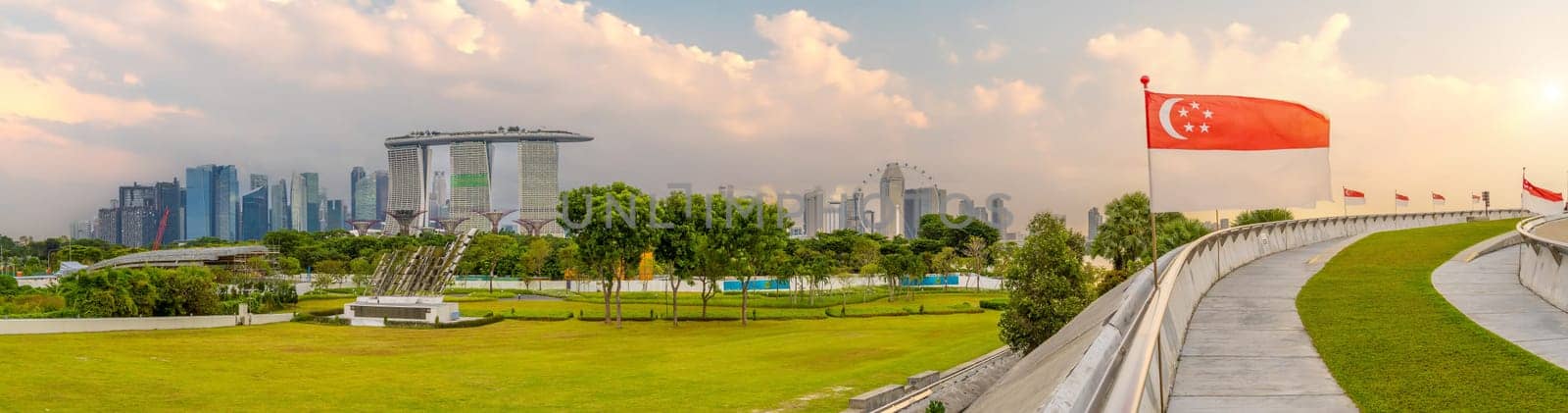 Downtown city skyline at the marina bay, cityscape of Singapore at sunset from Marina Barrage