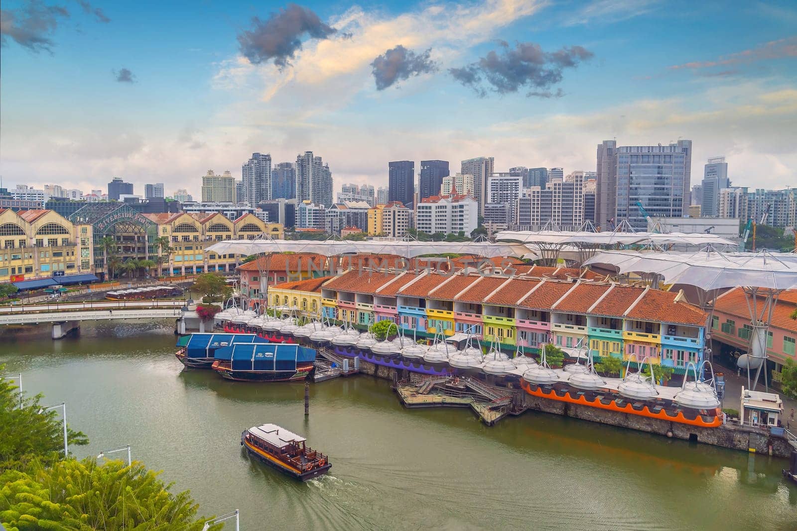 Aerial view cityscape of Clarke Quay, Singapore city skyline at sunset