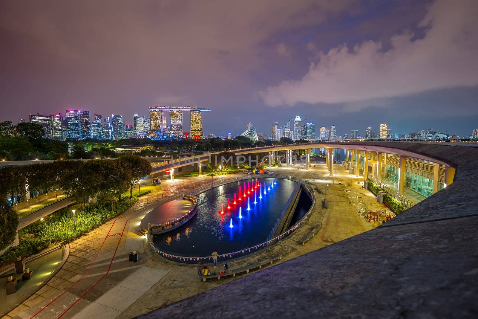 Downtown city skyline at the marina bay, cityscape of Singapore at sunset from Marina Barrage