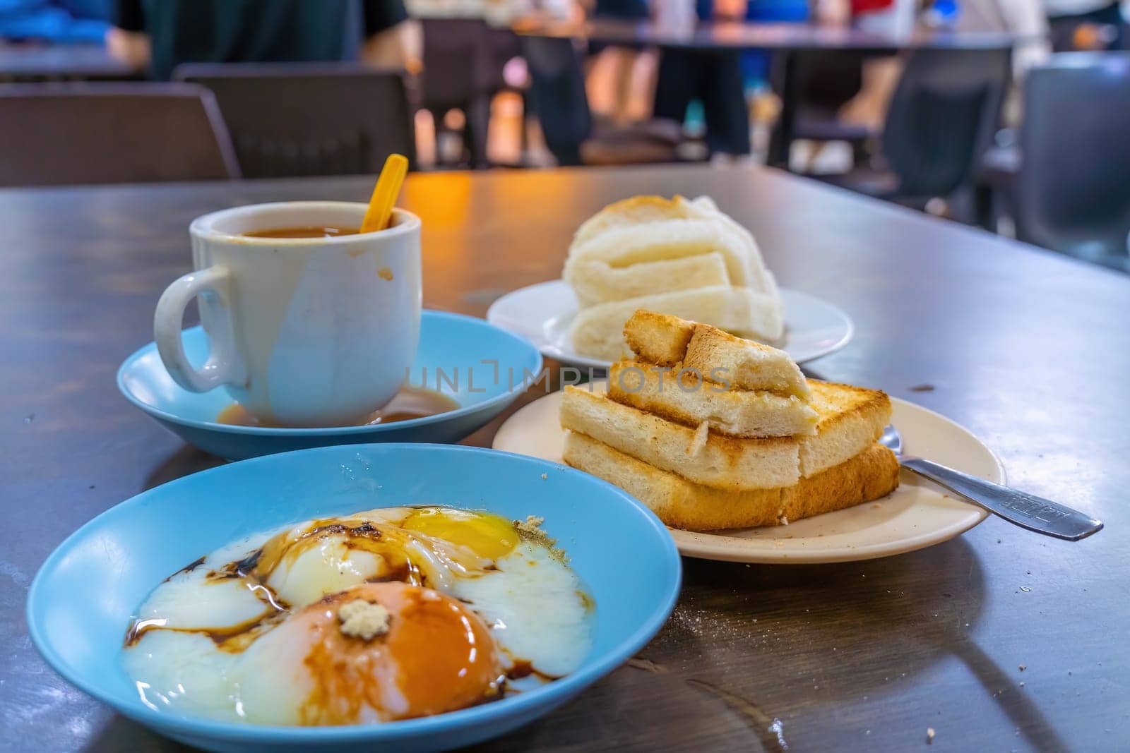 Traditional breakfast set and coffee, boiled eggs and toast, popular in Singapore and Malaysia