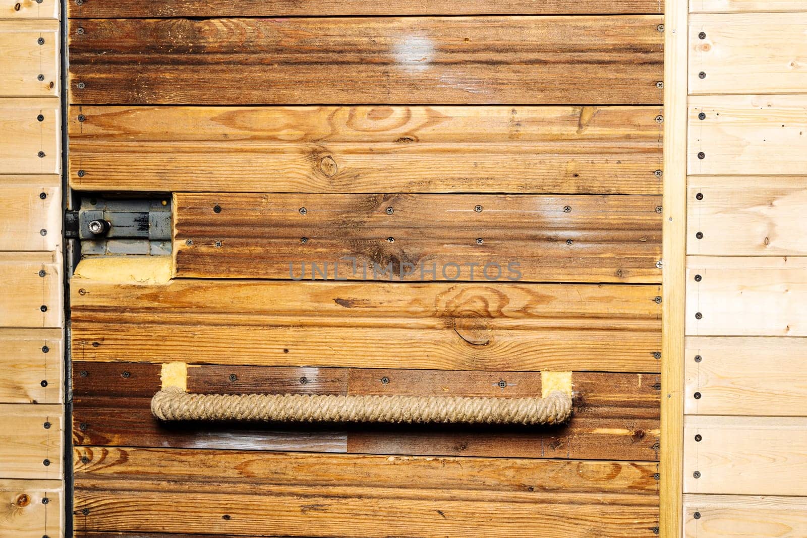 entrance door of the workshop or garage is sheathed in wood by audiznam2609