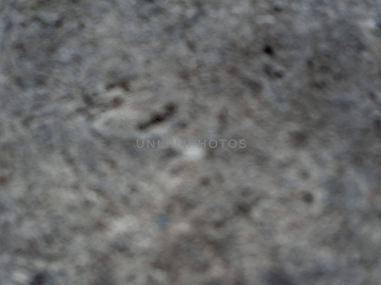 Full frame blur texture of the rough concrete flooring by Satakorn