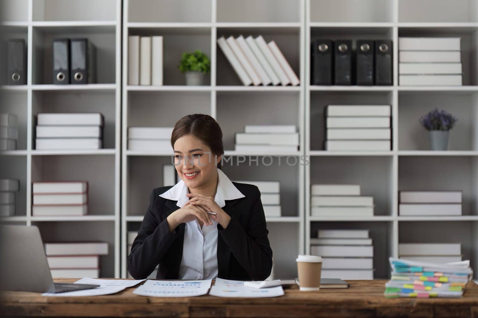 Accountant woman working on laptop and do document, tax, exchange, research, accounting and Financial advisor concept by itchaznong