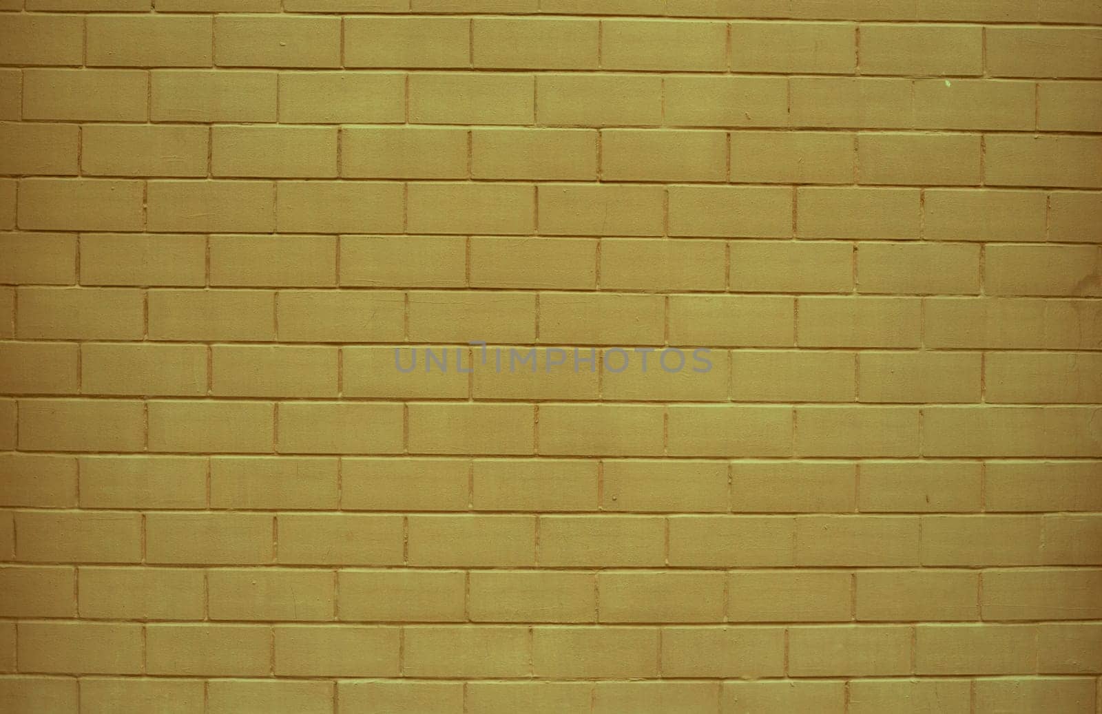 Abstract background of a large orange-brown brick wall. Background for design with copy space.