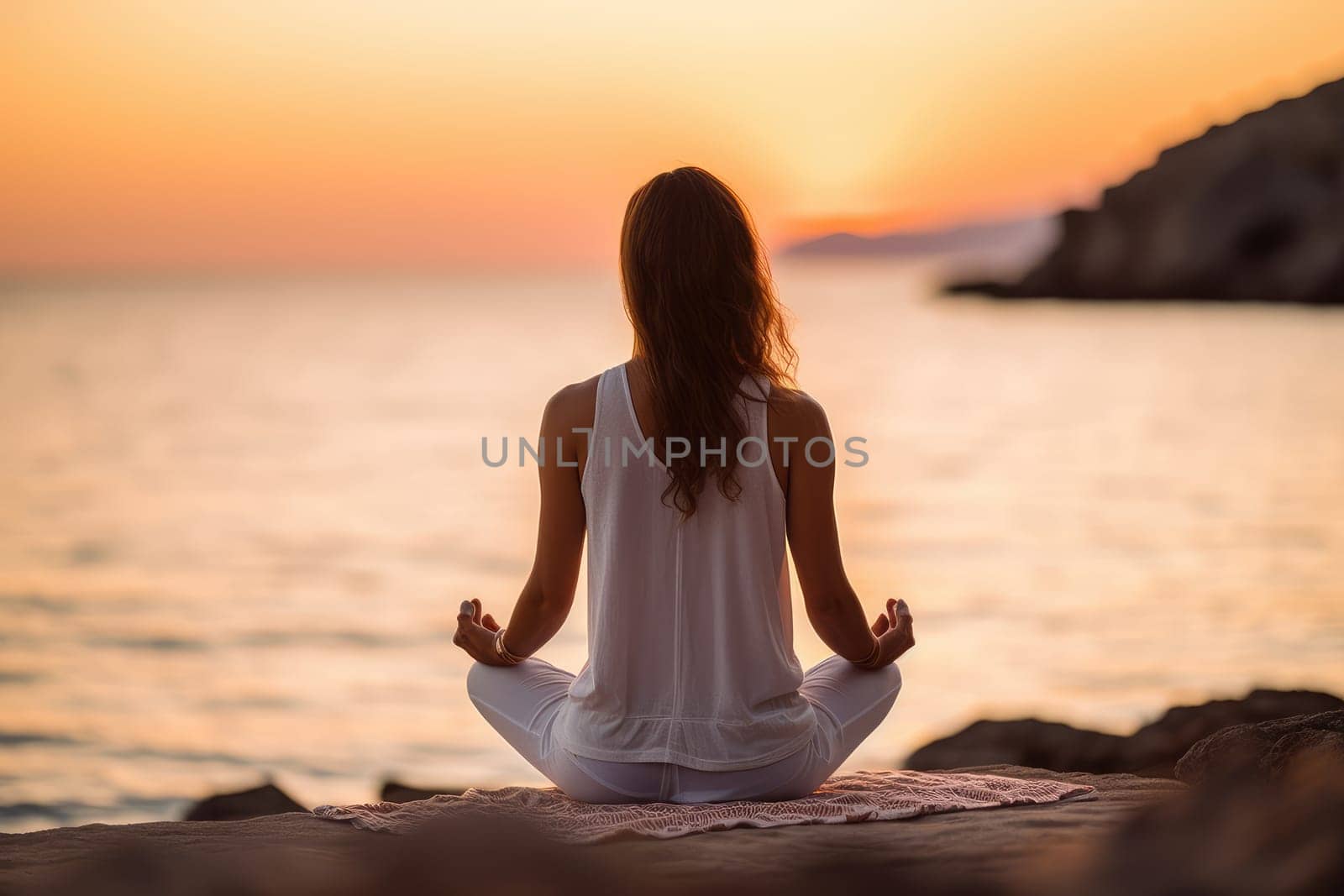 Unrecognizable woman sitting in lotus pose on the beach meditating , Generative AI by Desperada