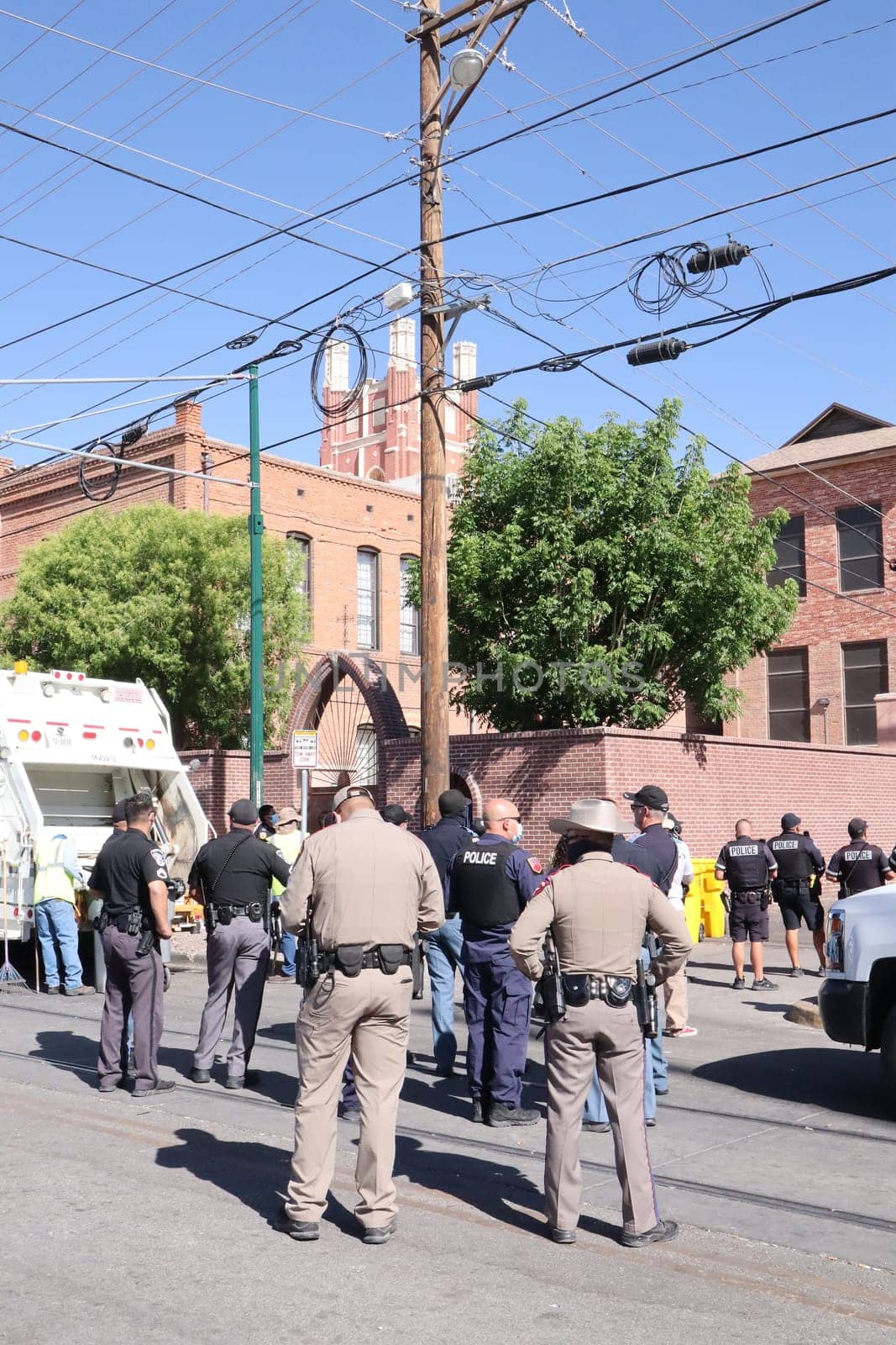 El Paso, TX, USA, May 10th, 2023: Police and troopers guarding Sacret Heart church as immigrants are awaiting Title 42 ending. waiting to approved to enter the USA under Title 42.