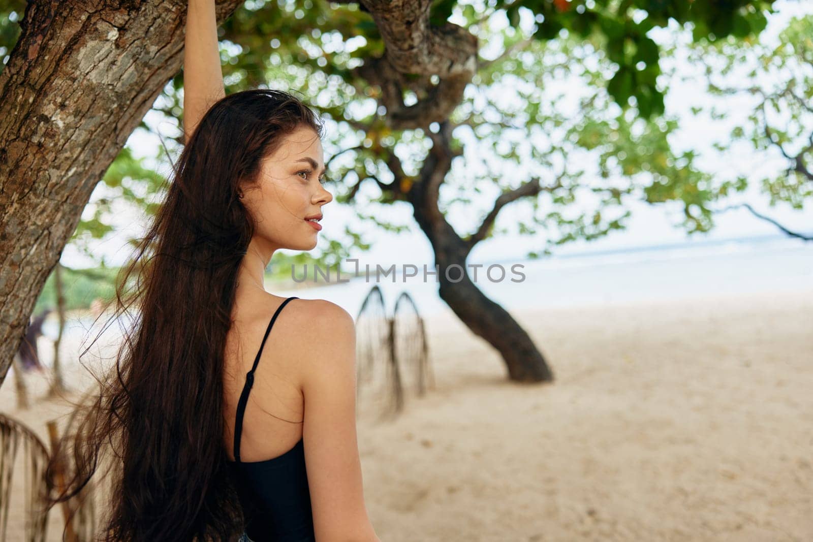 woman girl long ocean summer carefree young beauty freedom lifestyle beach coast shore copy sea hair sand vacation running space peaceful nature smile