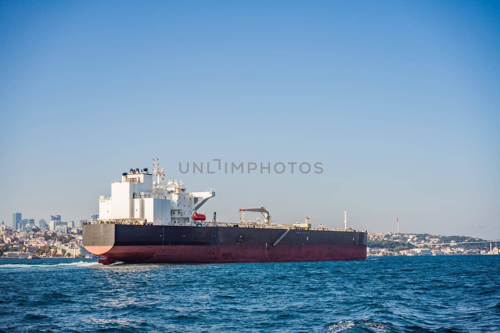 Container cargo ship in the Bosphorus, Istanbul, Turkey.