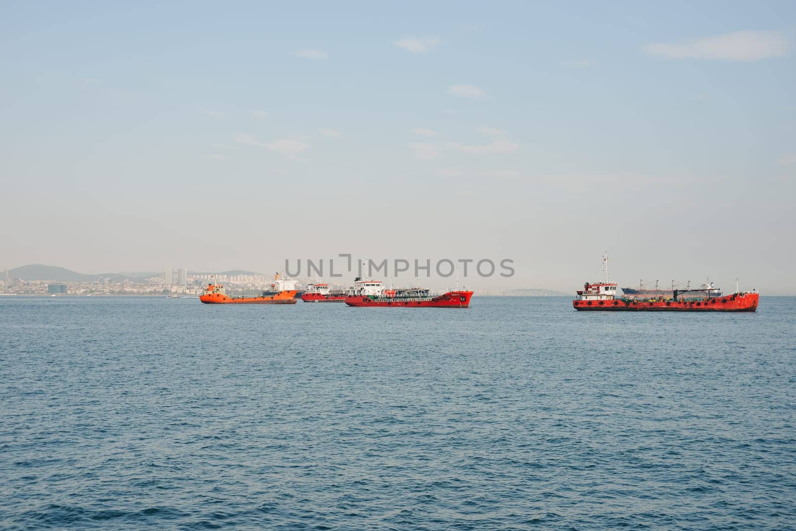 Istanbul, Turkey, May 02, 2023: Cargo ships pass through the Bosphorus, Istanbul by Ekaterina34