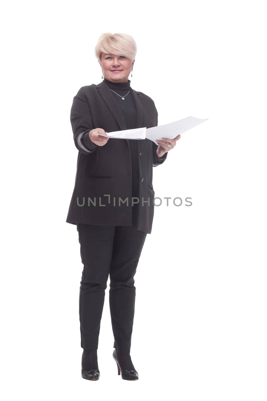in full growth. business woman with a stack of business documents. isolated on a white background.