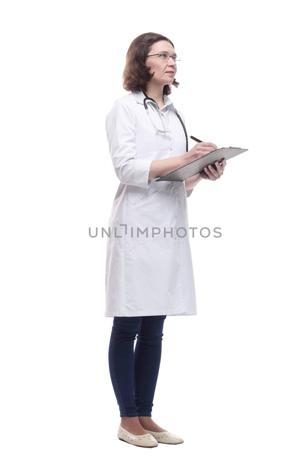 Mature female doctor with clipboard. isolated on a white background.