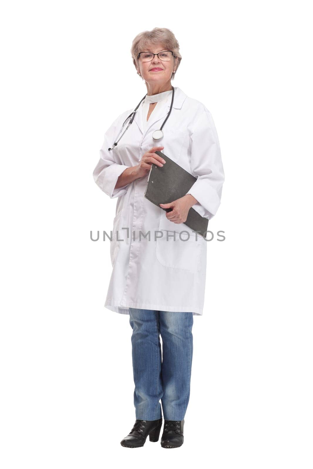 Front view of nice female doctor holding clipboard smiling isolated on white background.