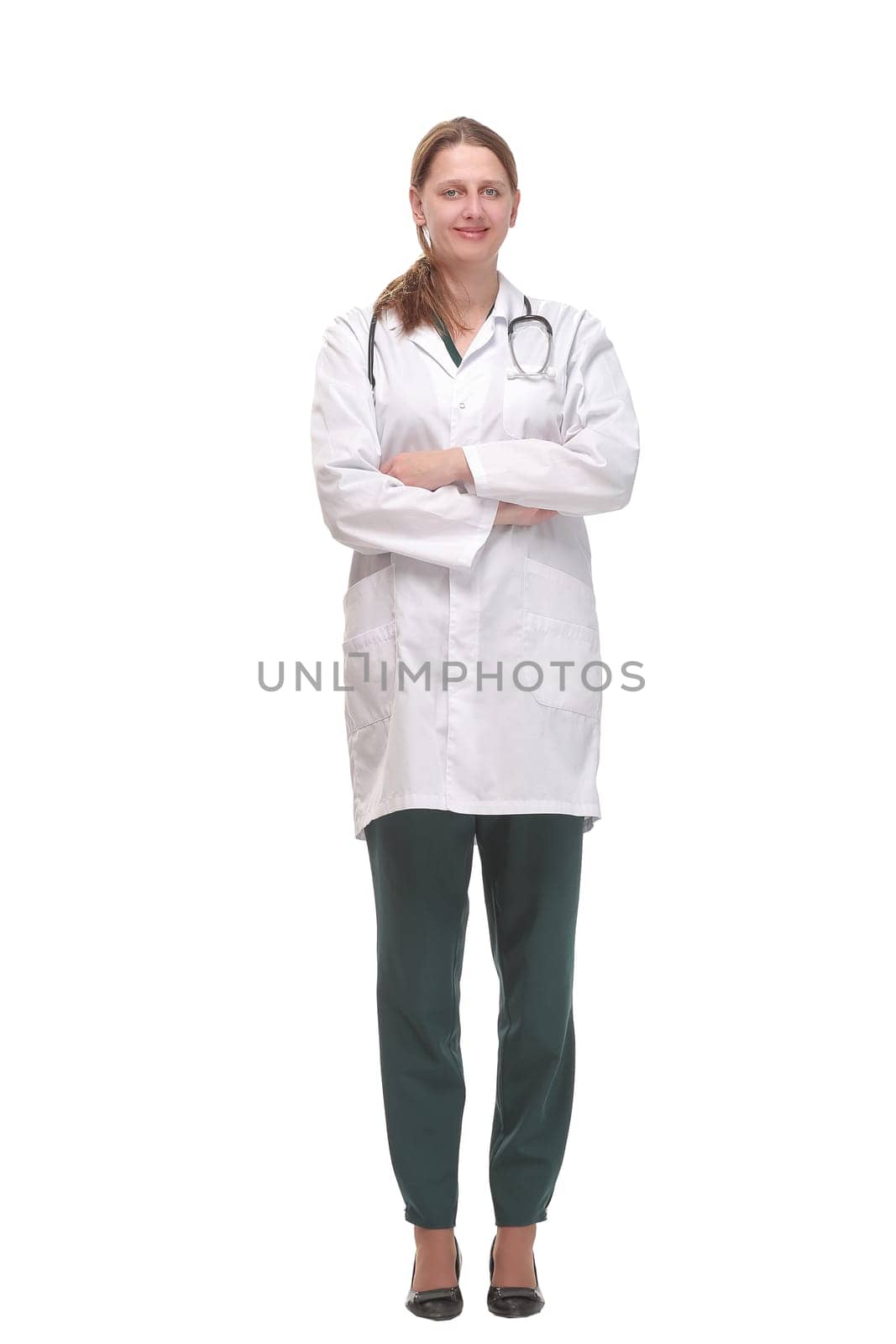 Front view of attractive happy smiling female doctor physician nurse standing with arms crossed, isolated on white