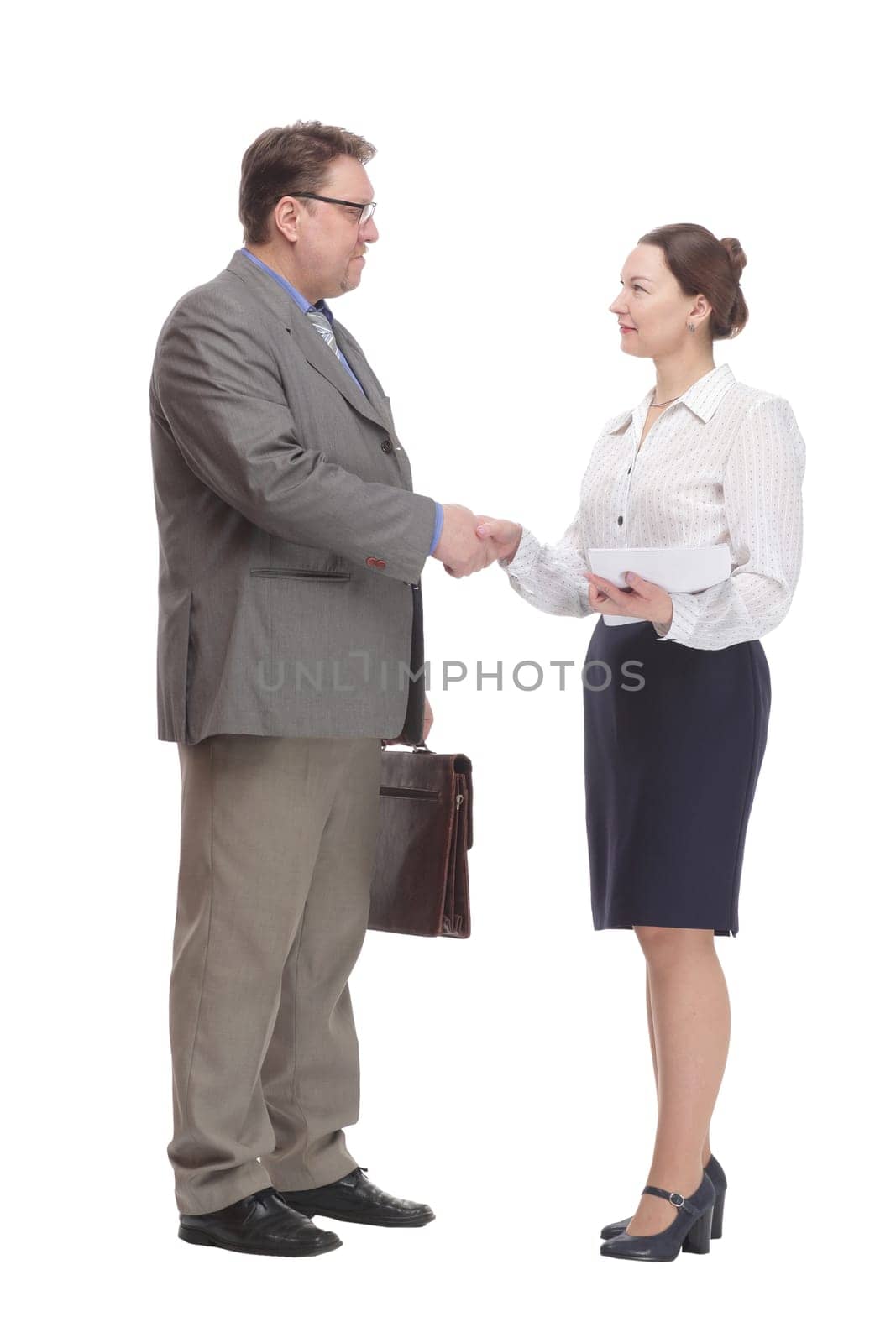 in full growth. businessman and business woman . isolated on a white background.