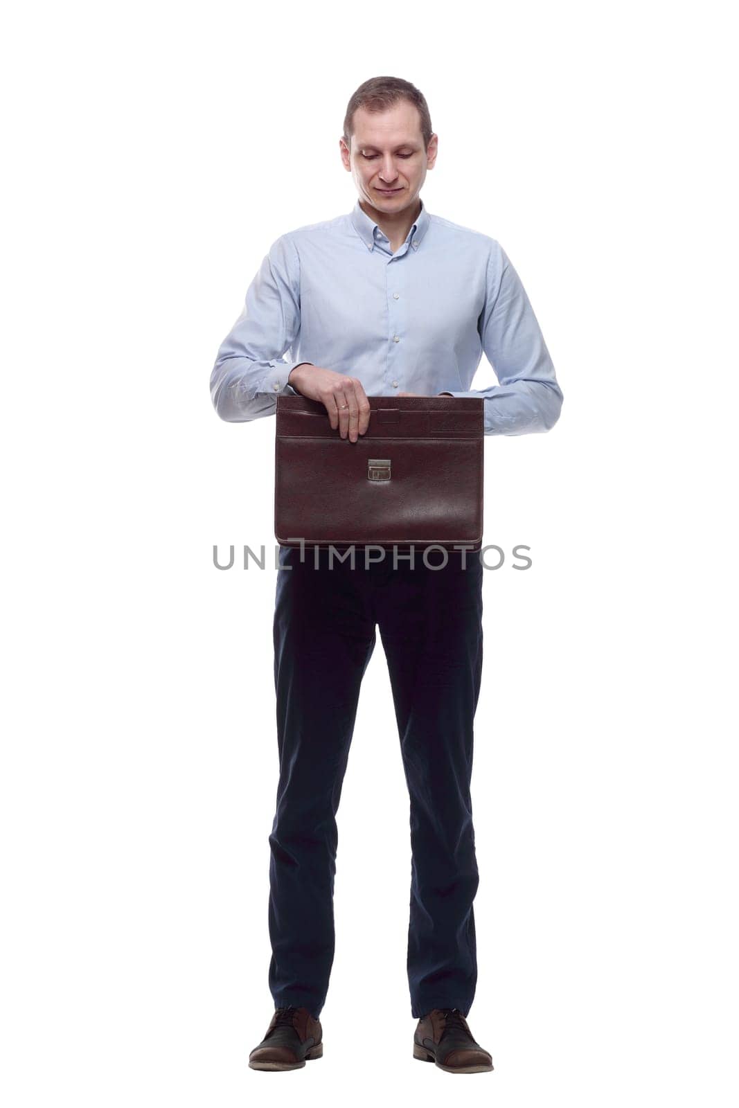 in full growth. responsible man with a leather briefcase . isolated on a white background