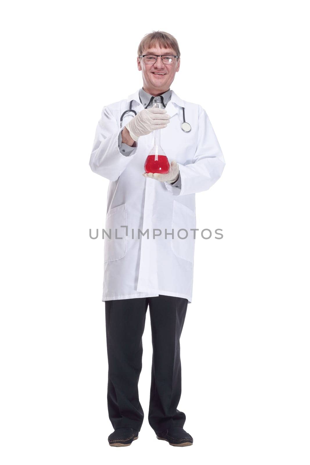 in full growth. laboratory flask with red liquid in the hands of the doctor.isolated on a white background.