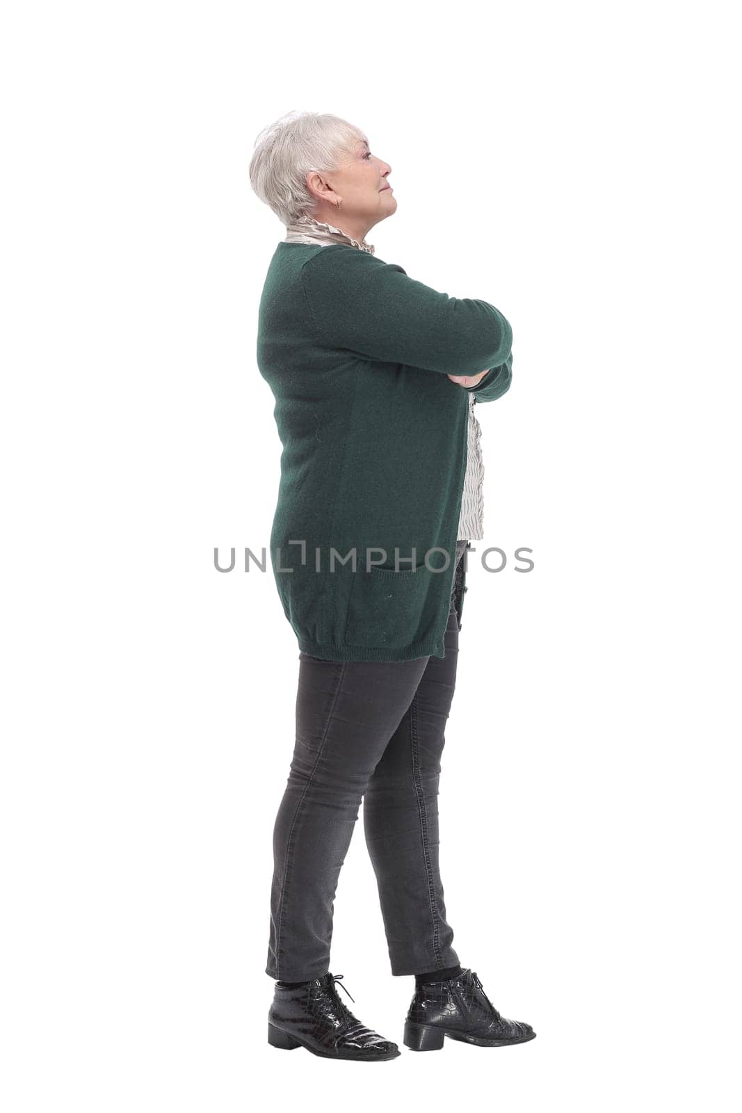 Side view of beautiful smiling caucasian business woman portrait arms crossed in studio isolated on white background