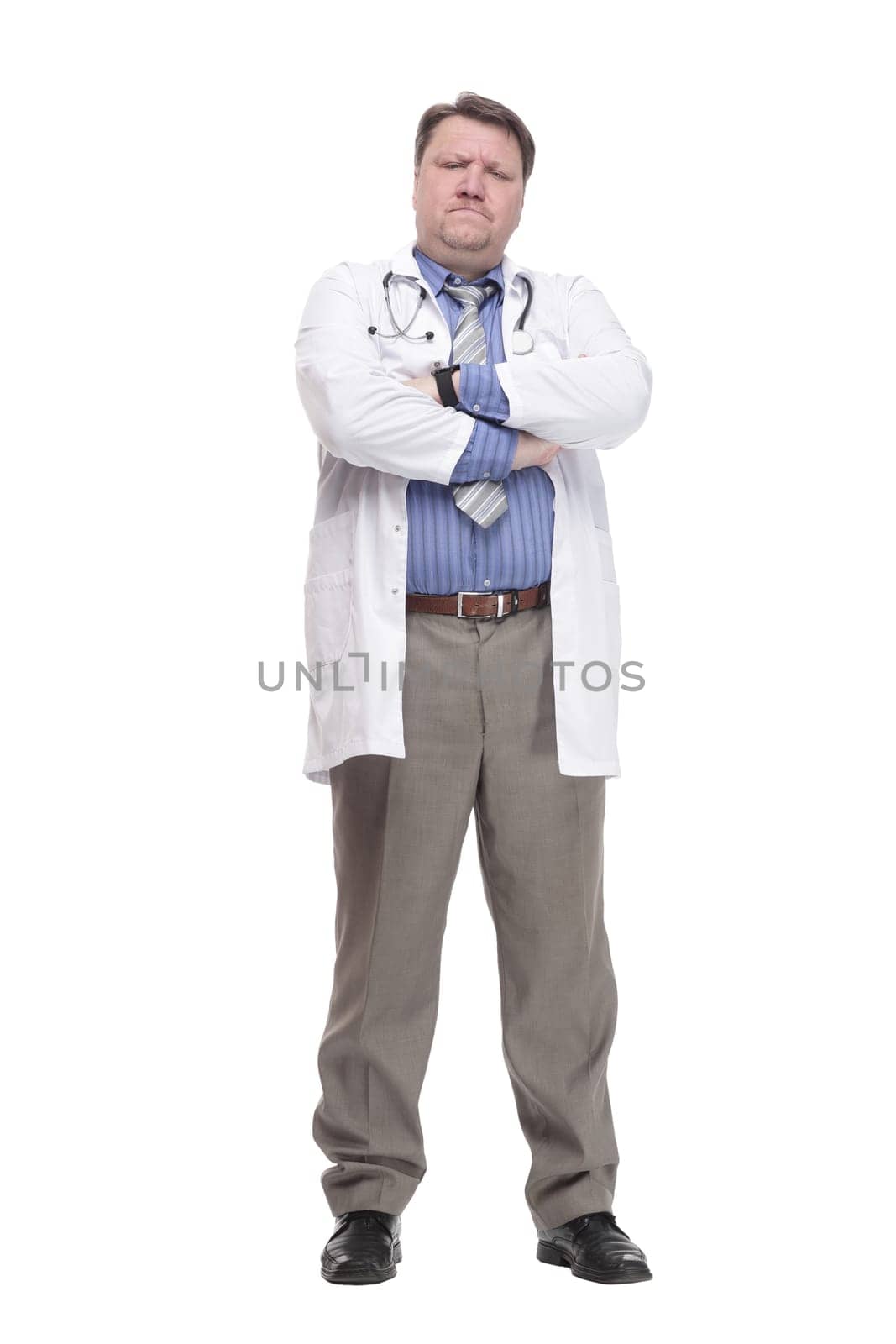 in full growth. friendly doctor in a white coat.isolated on a white background