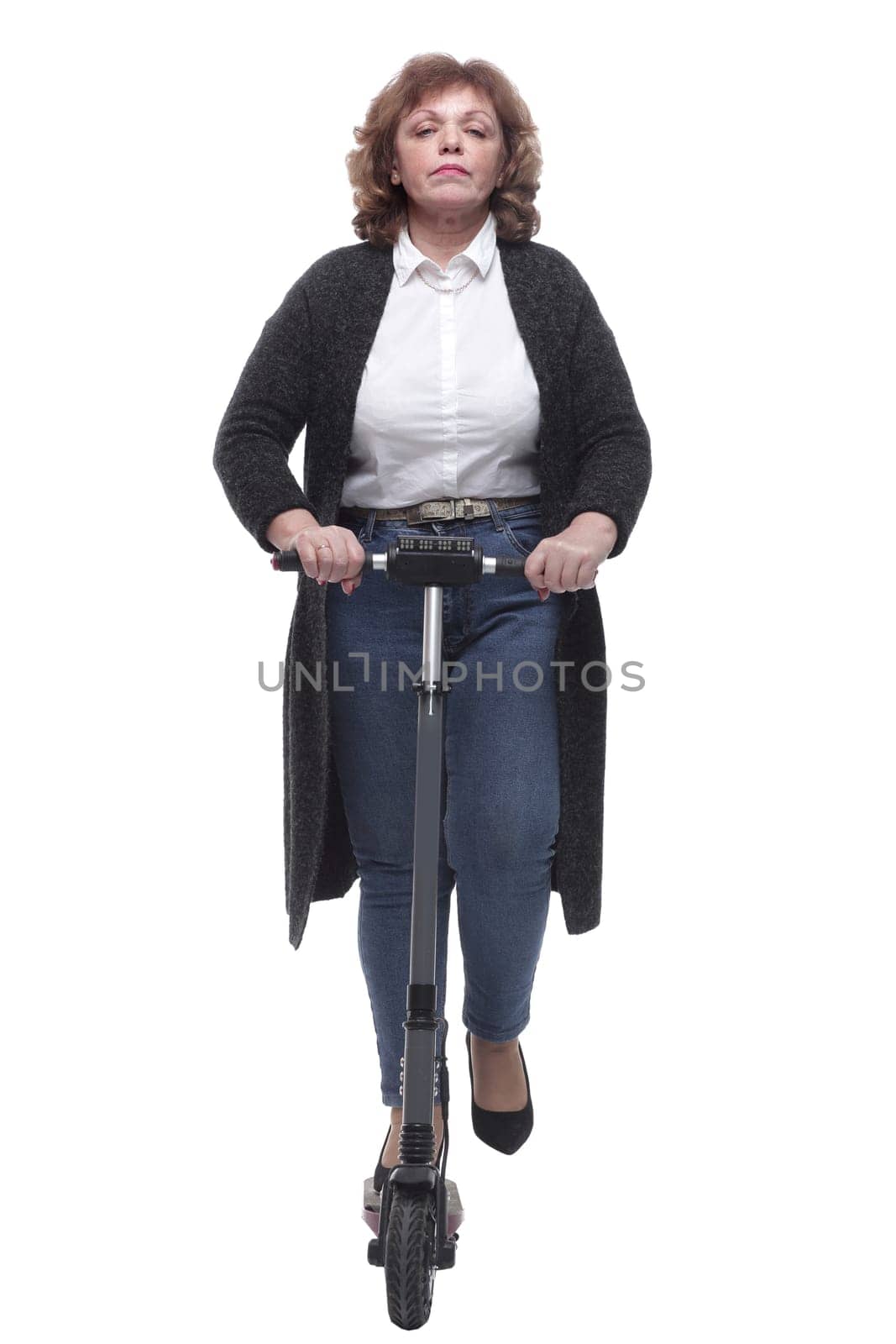 in full growth. modern adult woman with an electric scooter. isolated on a white background