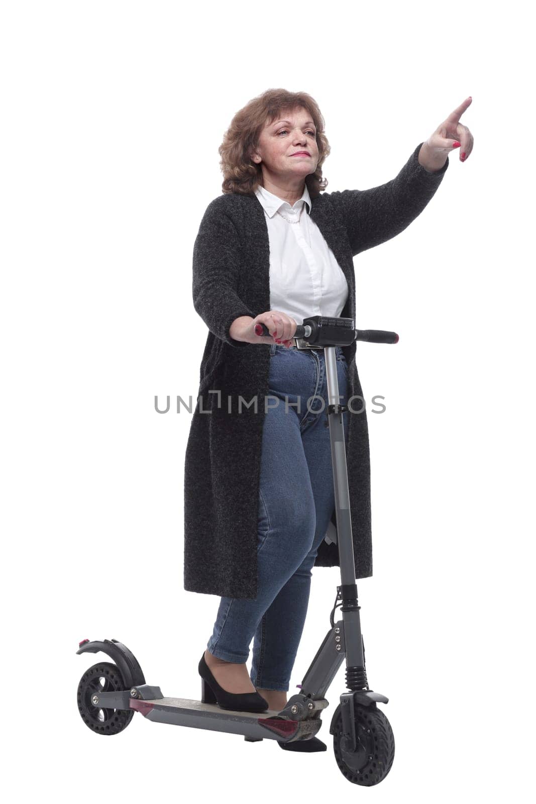in full growth. confident adult woman with an electric scooter. isolated on a white background