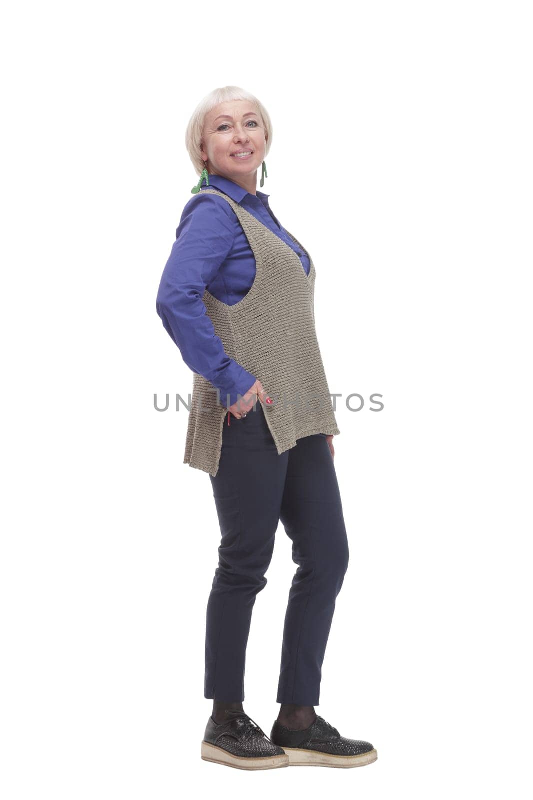 in full growth. attractive Mature woman in a gray vest. isolated on a white background.