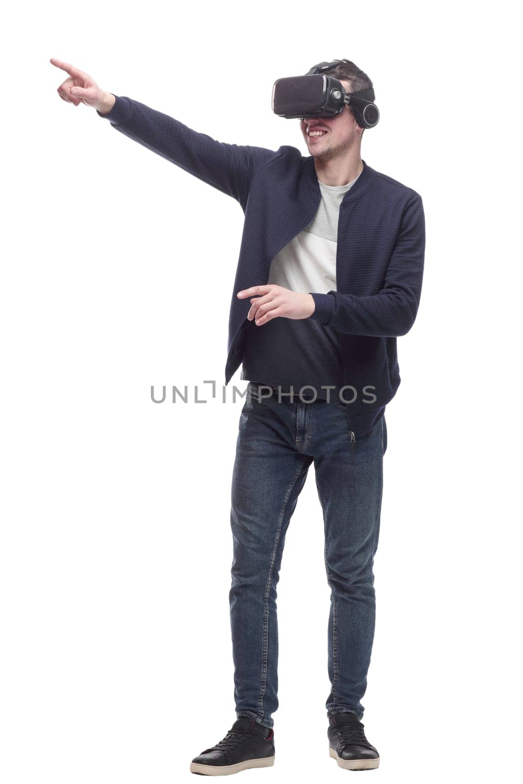 young man in a virtual reality helmet. isolated on a white background.