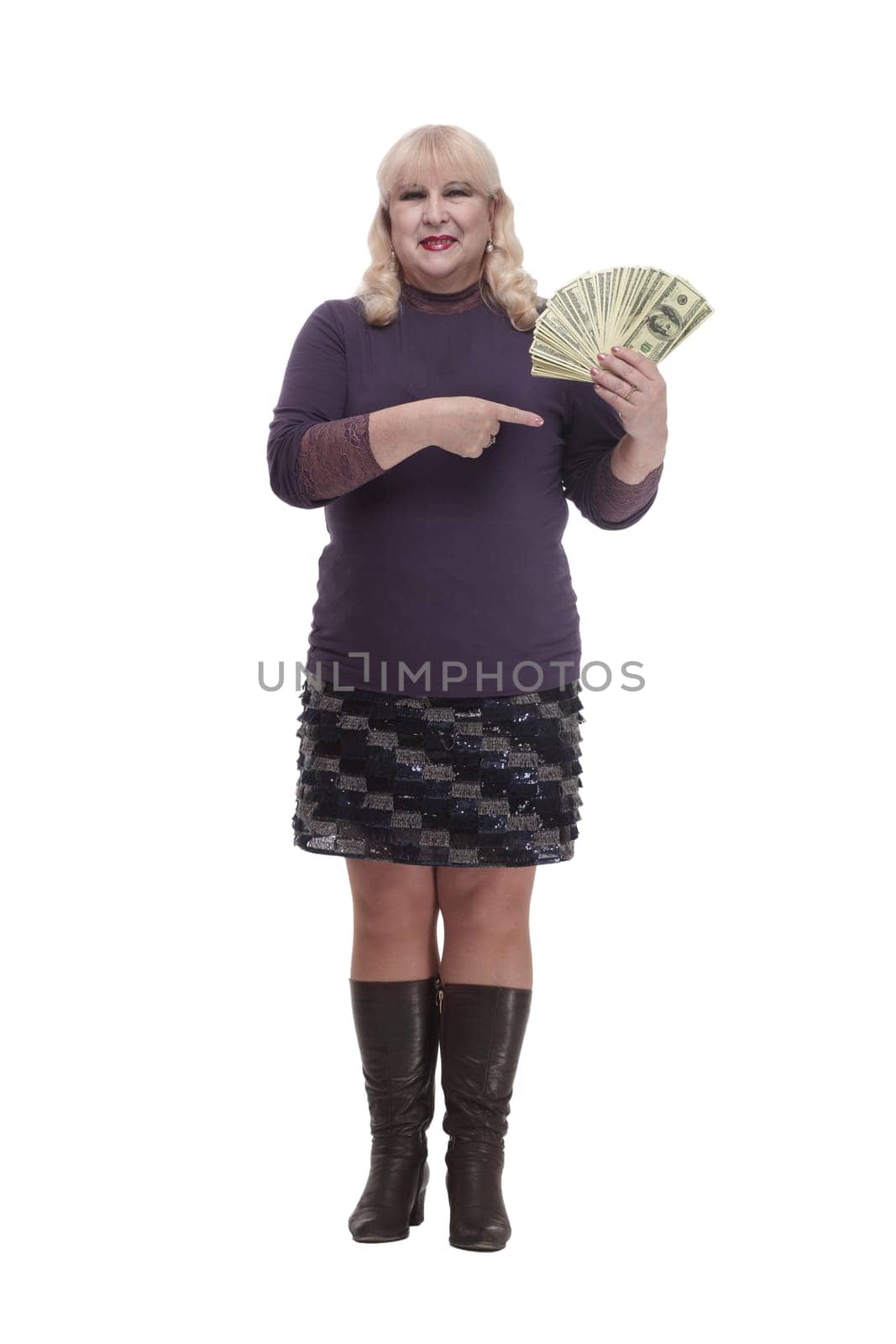 full-length.casual mature woman with banknotes . isolated on a white background.