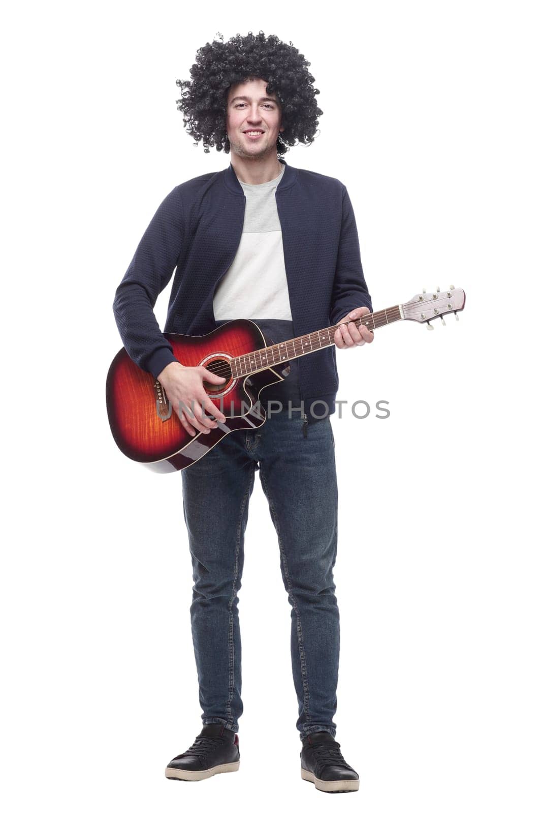 funny curly-haired guy with a guitar . isolated on a white background.