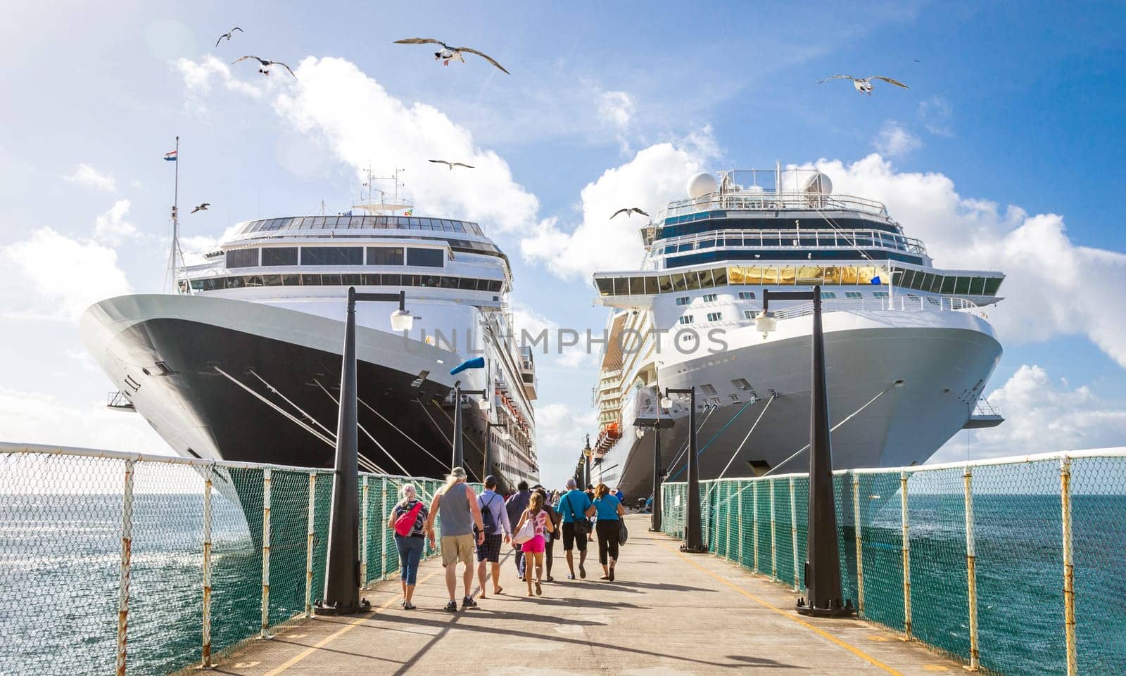 Cruise passengers return to cruise ships at St Kitts Port Zante cruise ship terminal by Mariakray