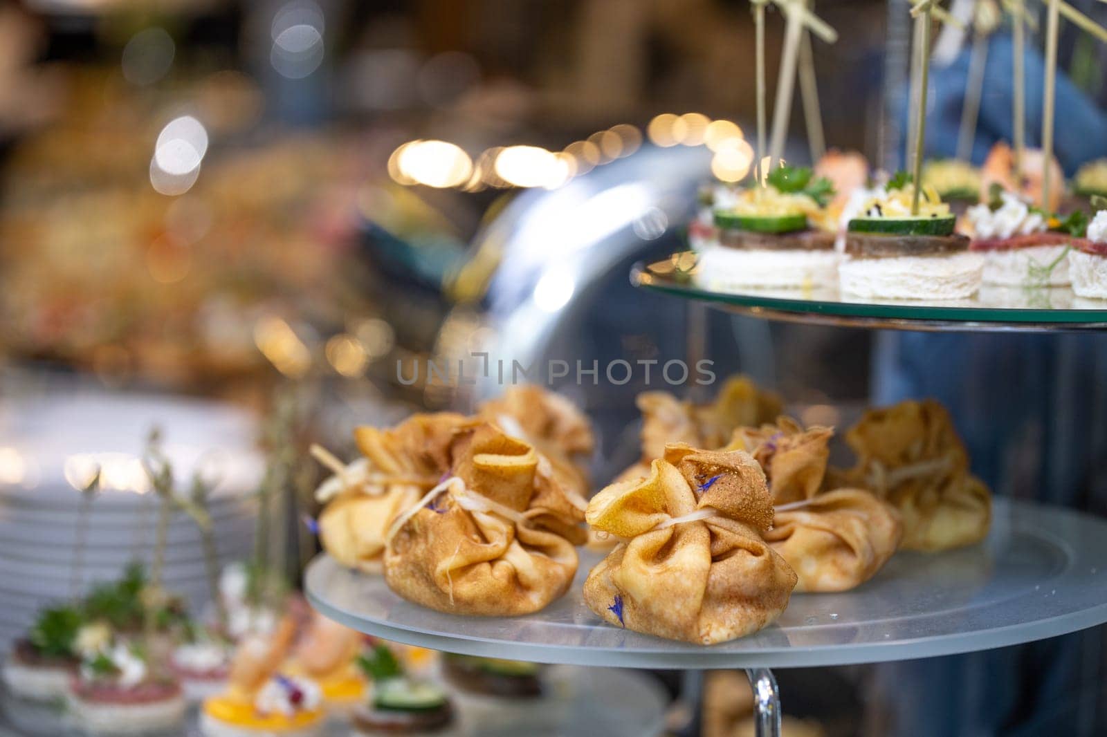 pancake bag with filling on the buffet table with snacks.