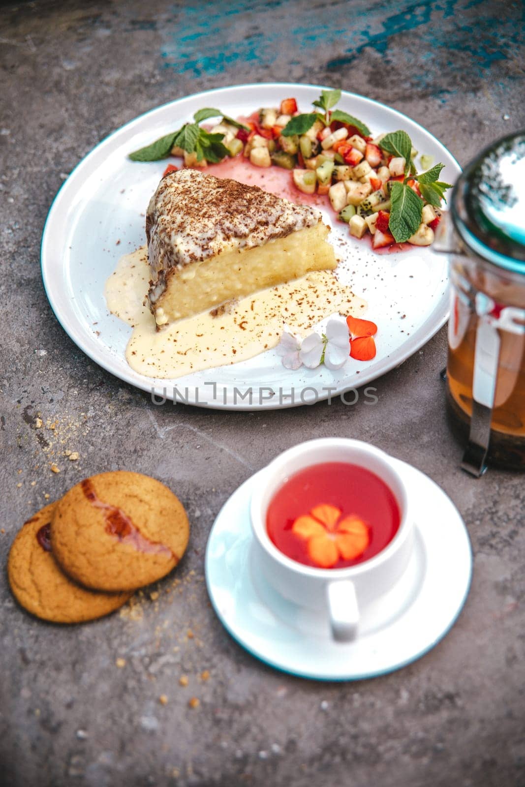 top view of a fresh sponge dessert on a white plate by Pukhovskiy