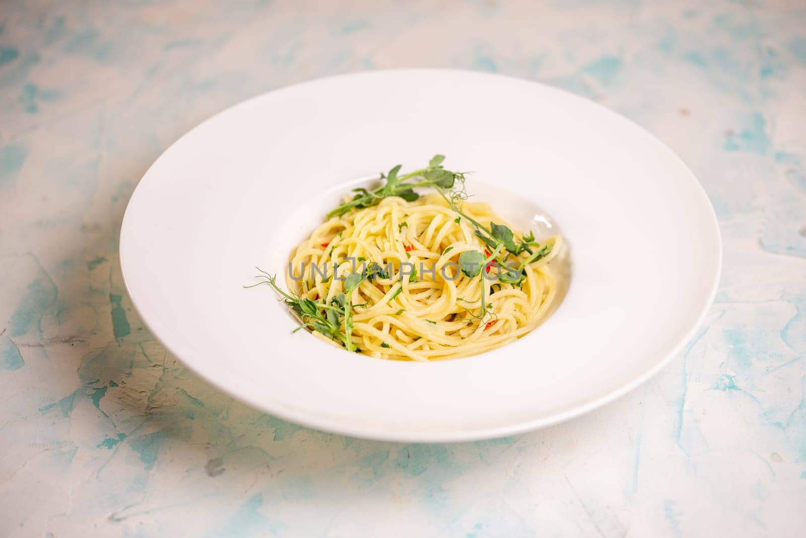 top view of the pasta of hard varieties in a white plate.