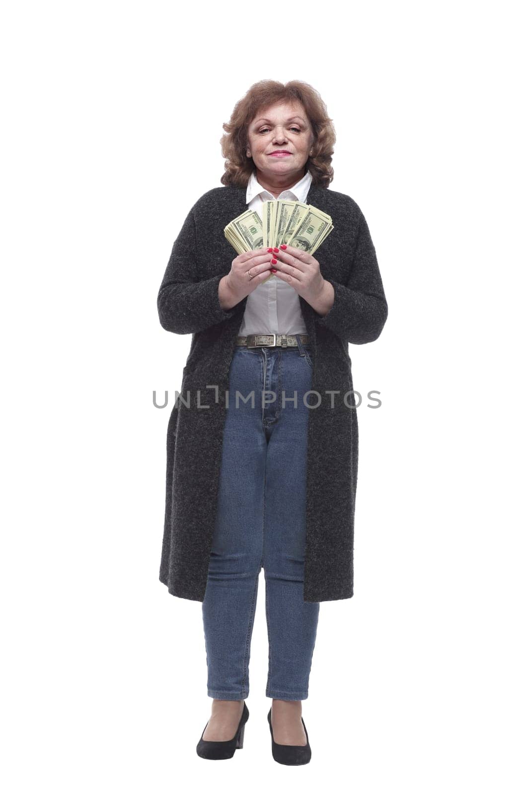 in full growth. woman showing a lot of cash bills. isolated on a white background