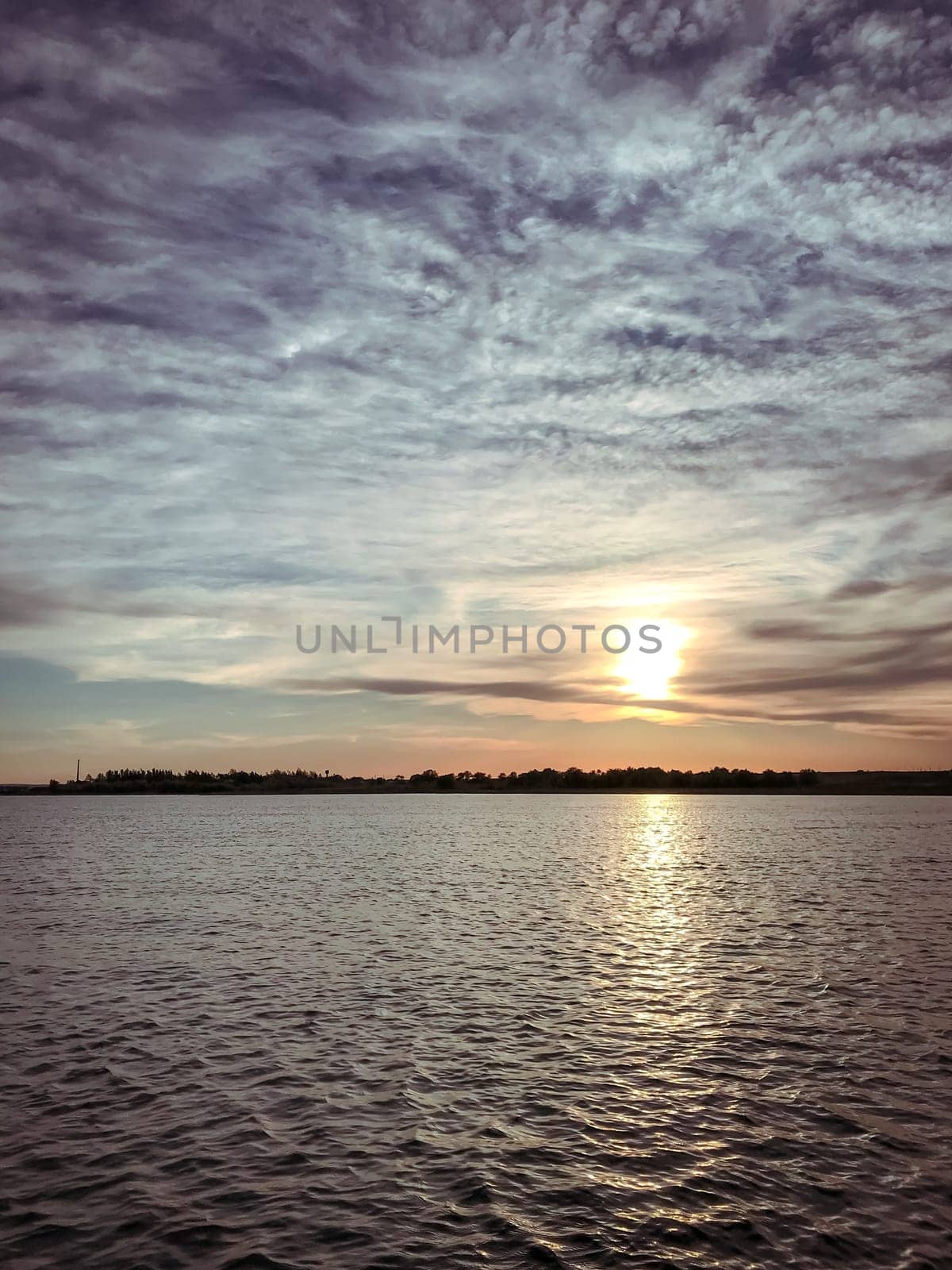 beautiful summer sunset on the lake of kazakhstan by Pukhovskiy