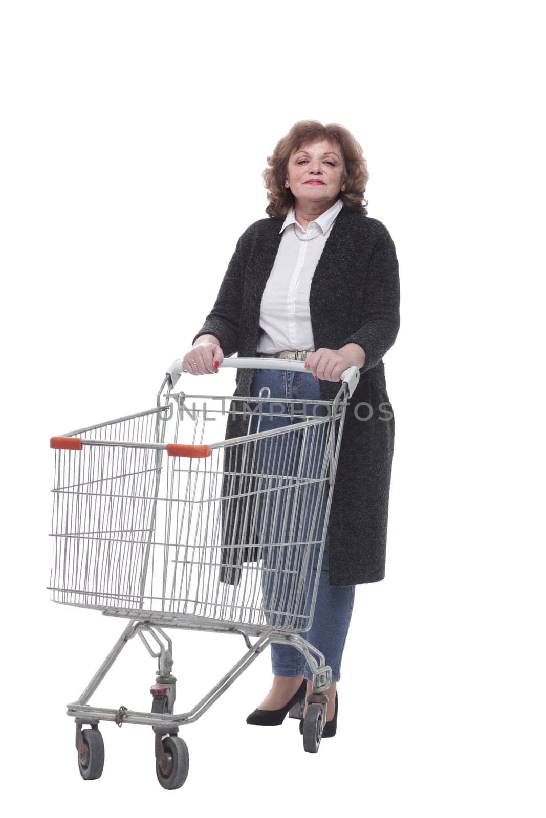 in full growth. casual woman with shopping cart. isolated on a white background