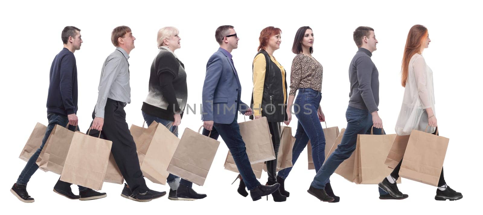 a group of people stand in line with shopping bags. isolated on white