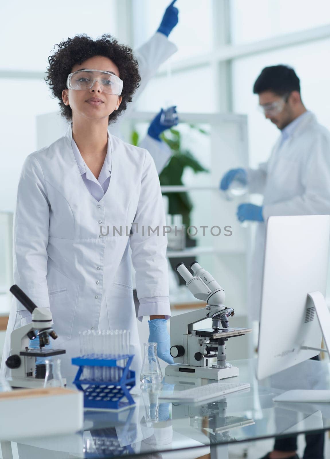 Scientists smiling together in lab